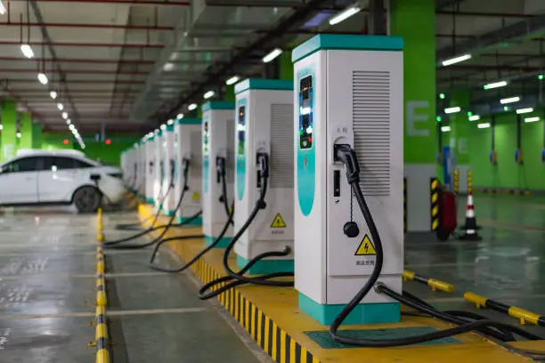 Electric car fast charging station, environmental protection, alternative energy, sustainable development concept